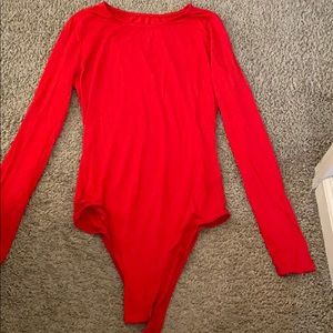 RED BODYSUIT NEVER WORN! But tag is off.